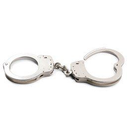 Smith and Wesson model 100 nickel finish handcuffs, one pair.